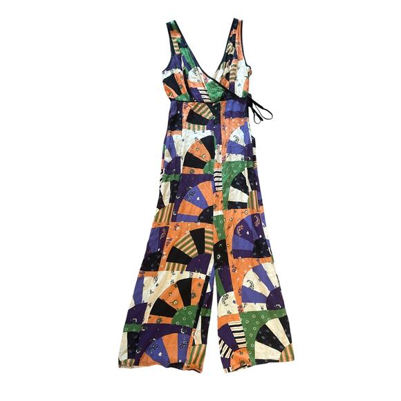 Urban Outfitters Pants - Women 8 UO Urban Outfitters Patchwork Surplice Printed Jumpsuit Deep V Crossover